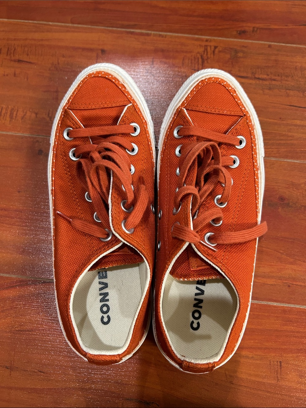 Converse Women Low Top Canvas Sneakers - Rust Orange.  Worn only a few times.
